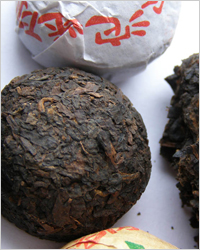 Прессованный китайский черный чай пуэр